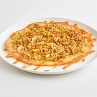 Apple Crisp Dessert Pizza · A dessert made entirely from scratch, featuring our handmade thin crust topped with brown su...
