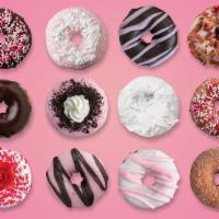 Box of Chocolates Assortment · Get our Box of Chocolate-Inspired Donuts now through February 14. Candied Roses, Love Sprink...