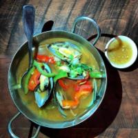 Steam Mussel( green curry sauce) · Steam mussel, lemongrass and basil leaves with ( green curry sauce)