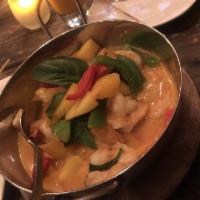 Mango Red Curry · Mango, basil and bell pepper. Hot and spicy.