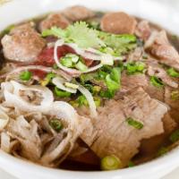 PS. House Special Pho · A special combination of round steak, flank, meatballs, well-done brisket, tripe, and tendon.