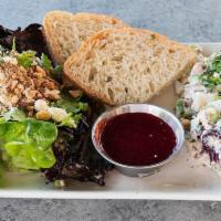 Raspberry Chicken Salad · Organic chicken salad with pecans, apples, gorgonzola and mayonnaise with mixed greens and r...