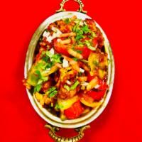 Baltin Special · Chef's special curry with bell peppers, mushrooms, broccoli, panner, prawn, lamb, and chicke...