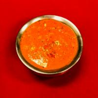 Fish Tikka Masala · Fish cooked with tomato, onion, ginger, garlic and spices.
(Naan bread recommended)