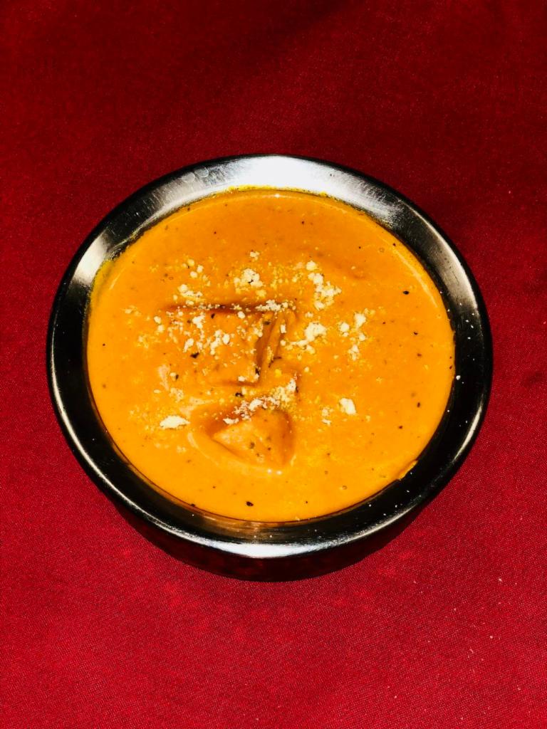 Fish Tikka Masala · Fish cooked with tomato, onion, ginger, garlic and spices.
(Naan bread recommended)