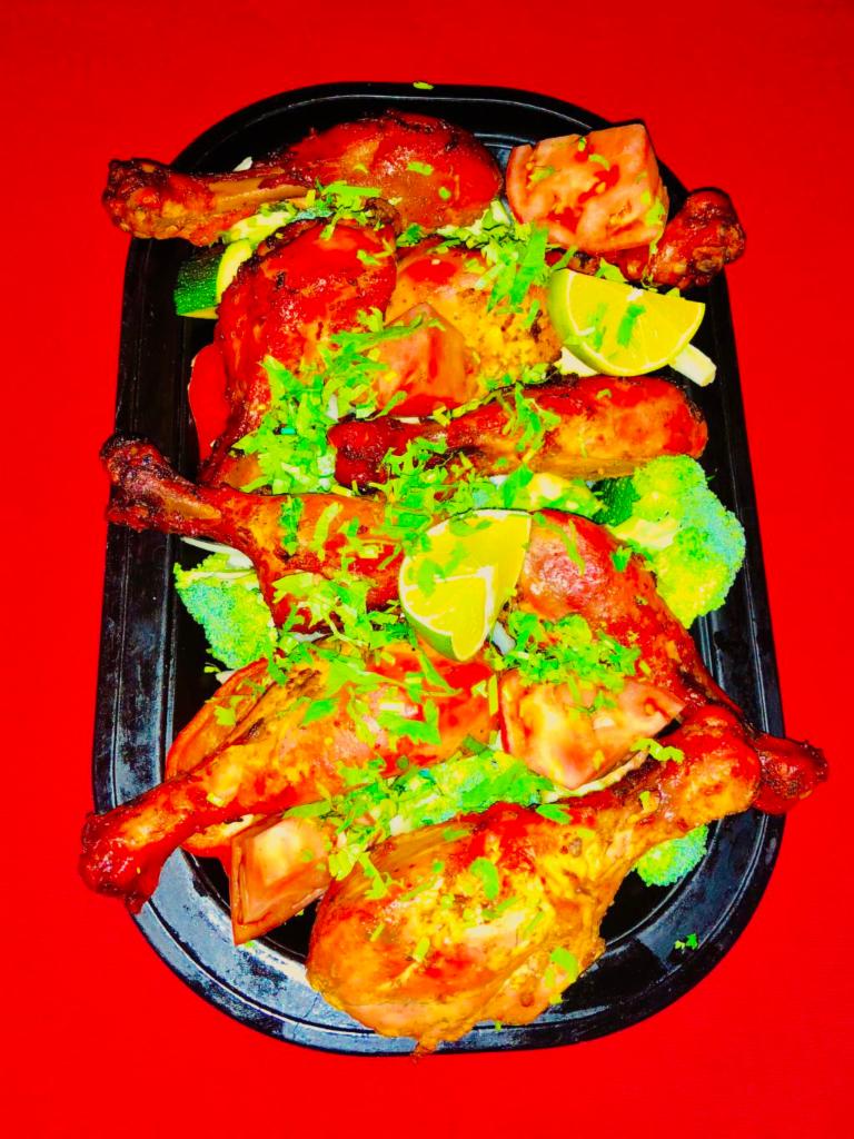 Chicken Tandoori · Chicken leg marinated in yogurt sauce and grilled on a tandoori oven.
