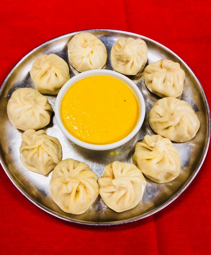 Lamb Momo · Steamed lamb dumplings spiced with garlic, ginger, onion and spices.