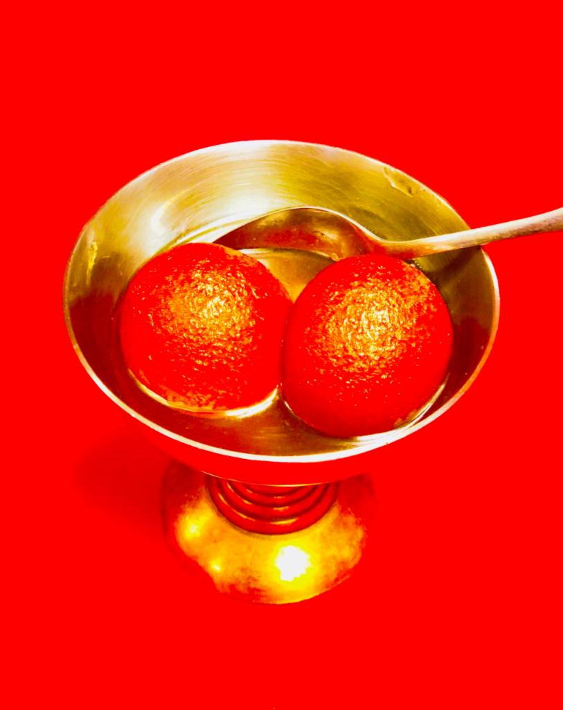 Gulab Jamun · Balls of milk and wheat served with sugar syrup and flavored with rose water.