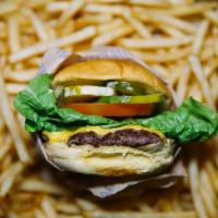 TWP Junior Burger · 4 oz. Pat La Frieda beef blend, American cheese, lettuce and tomato, Sriracha mayo and potat...