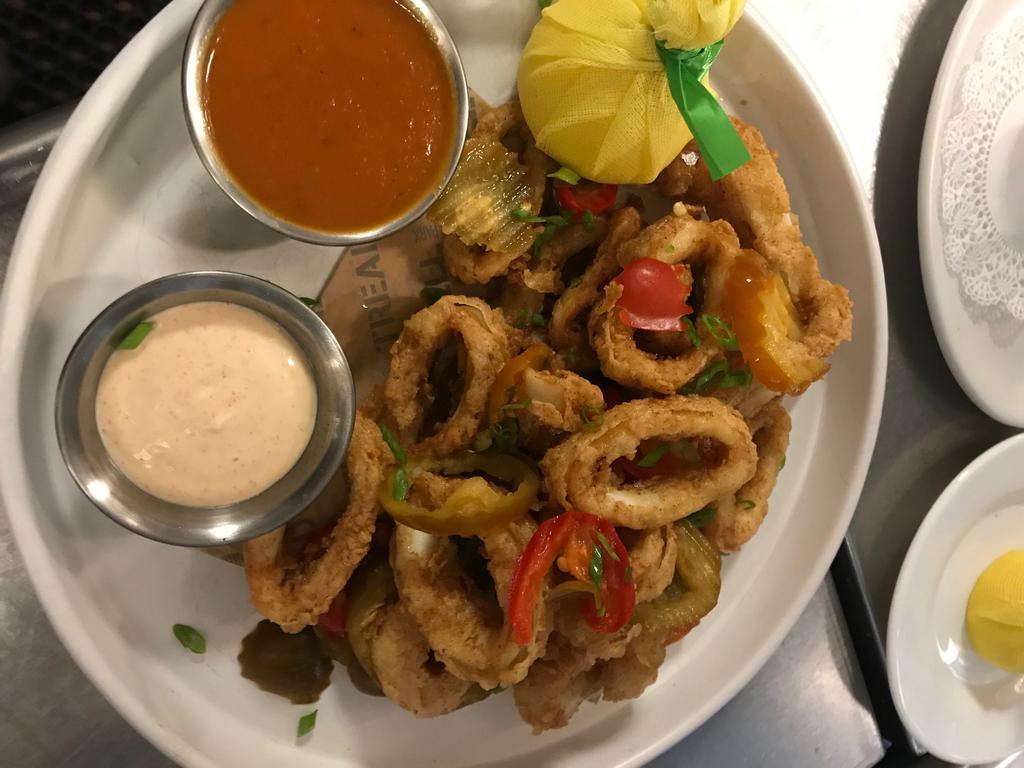 Crispy Calamari · Cherry peppers, spicy marinara sauce and lemon aioli.