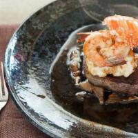 Surf and Turf Entree · Grilled filet Mignon, lobster tail and shrimp served with mushroom and truffle sauce.