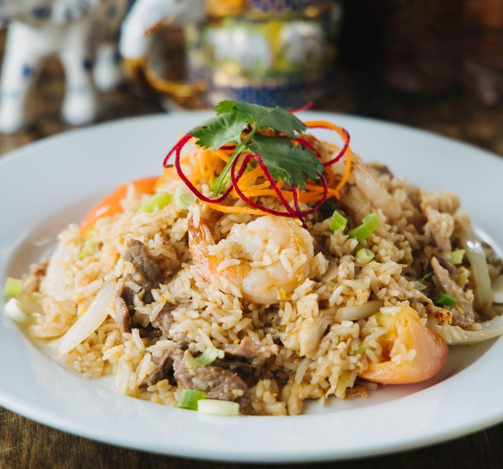 Combination Fried Rice · Fried rice with chicken, pork, beef, shrimp, onions and tomatoes. 
