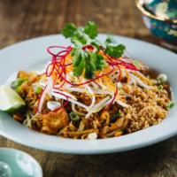 Pad Thai Noodles · Thin rice noodles, bean sprouts, tofu, eggs, crushed peanuts and scallions in a sweet tamari...