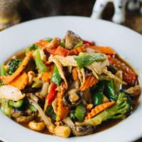 Chilies and Cashew · Chicken or tofu, cashew nuts and assorted vegetables in stir-fried in garlic chili paste. Se...