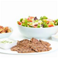 Chargrilled Lamb Family Feast for 4 · Sliced grilled lamb that includes a choice of salad with dressing, choice of side, and choic...