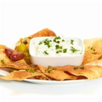 Taziki Dip · Greek yogurt, cucumber, dill, and a hint of lemon define this refreshing classic. Vegetarian.