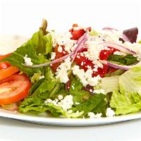 Greek Salad · Fresh mixed lettuces, tomatoes, cucumbers, roasted red peppers, red onions, feta, pepperonci...