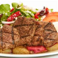 Grilled Beef Feast · Served with Horseradish sauce, a side Greek salad, a Baked Pita, and your choice of Roasted ...