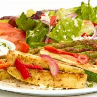 Grilled Veggie Feast · Grilled zucchini, squash, red peppers, onions, asparagus, with Taziki Sauce, a side Greek Sa...