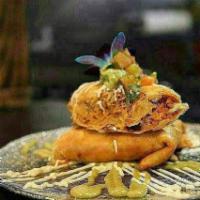 Shrimp Chimichangas · Fried burrito stuffed shrimp, rice, beans, cheese. sour cream, pico de gallo & guacamole