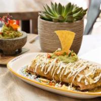 Veggie Burrito · Mushroom,sparragus,brussels sprouts and corn. Flour tortilla, rice, and beans, salsa verde, ...