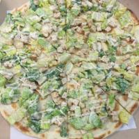 Grilled Chicken Caesar Salad Pie · Strips of marinated chicken over romaine lettuce topped with creamy Caesar dressing.