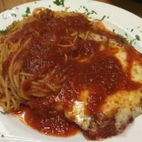 Veal Cutlet Parmigiana · Served with vegetable of the day or your choice of side pasta.