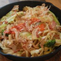 Yaki Udon · Yaki udon is a Japanese stir-fry dish consisting of thick, smooth, white udon noodles mixed ...
