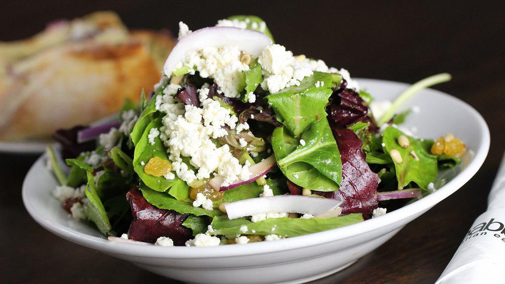 Spring Mix Salad · Spring lettuce mix, red onion, feta cheese, golden raisins, pine nuts and sweet vinaigrette.