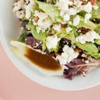 Napa Valley Salad · Spring mix lettuce, candied pecans, Gorgonzola, goat cheese and sweet vinaigrette.