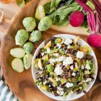 Roasted Brussels Sprouts Beet Salad · Spring lettuce mix, roasted Brussels sprouts, beets, golden raisins, red onions, sliced almo...