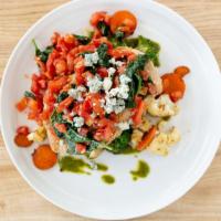 Garlic Spinach and Tomato · Sauteed spinach, tomatoes, garlic topped with Gorgonzola cheese.