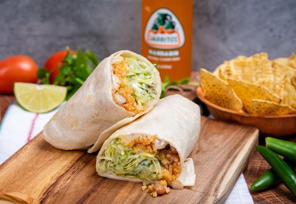 Super Veggie Burrito · Whole Beans, rice, fresh salsa, cheese, guacamole, sour cream, and lettuce but extra of everything.