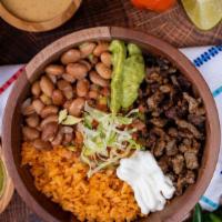 Super Burrito Bowl · Rice, Whole beans, salsa, sour cream, guacamole, and cheese.