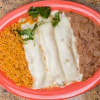 Enchiladas · Your choice, of cheese, chicken, or beef filling with rice and beans on the side. 3 enchilad...