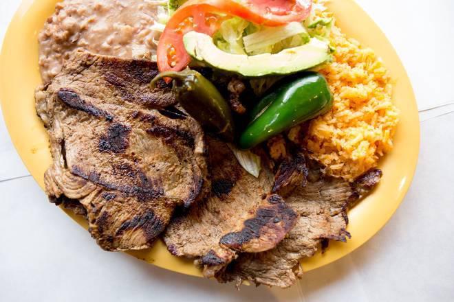 Plates · Your choice of meat, beans, and rice. Choice of flour or corn tortillas.