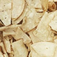 Chips and Salsa  · Our well-known homemade tortilla chips with our signature table sauce with a touch of chipot...