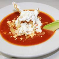 Sopa Tarascas  · Traditional Mexican tortilla soup with chicken. Topped off with avocado, sour cream and anej...