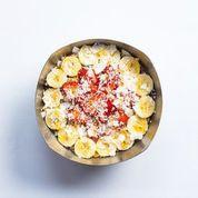 Tropical Bowl · Base blend of organic acai, coconut milk, apple juice, bananas, mango, pineapple and flax seed. Topped with organic granola, bananas, strawberries, coconut shavings, and honey.