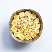 Nutty Bowl · Base blend of organic acai, almond milk, apple juice, peanut butter, bananas, strawberries and flax seed. Topped with organic granola, bananas, almonds, and honey.