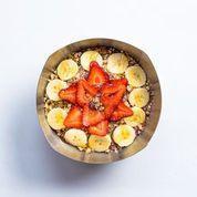 Small Breakfast Bowl · Acai blended with apple juice, non-fat milk, flax seed, banana and strawberries topped with ...