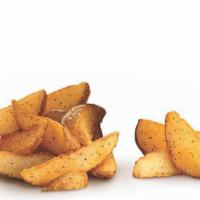 Wedge Cut Fries · Fudd's wedge cut fries, seasoned.