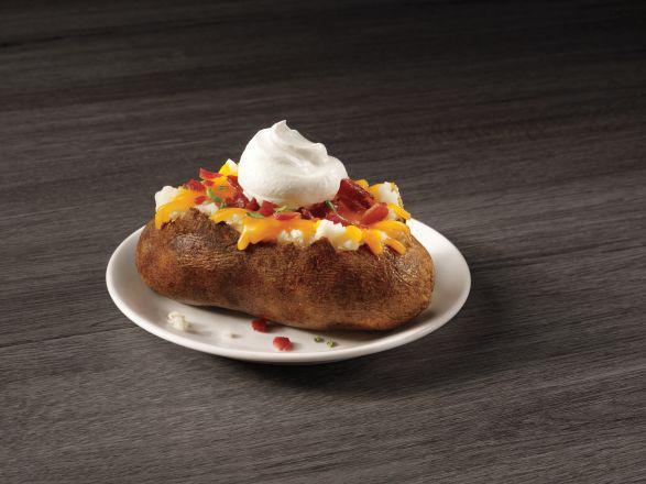 Loaded Baked Potato · A perfectly baked potato, loaded with cheese and bacon.