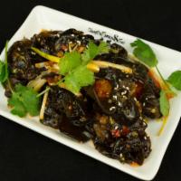 Black Mushroom with Chopped Chili Pepper · Crunchy black mushroom and pickled red chili. Spicy.