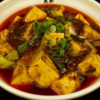 Mapo Tofu · Tofu with hot chili sauce. Comes with a bowl of white rice. Spicy.