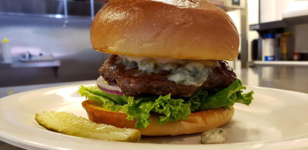 Blue Moo Burger · On a kaiser bun with crumbled bleu cheese, moo sauce, lettuce, tomato and red onions.