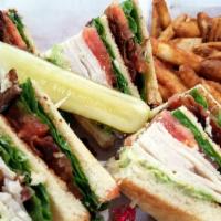 Club Sandwich · Triple Decker toasted white bread, turkey, bacon, lettuce, tomato and mayonnaise.