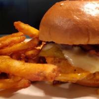 Chipotle Chicken Sandwich · On a grilled kaiser bun, chicken breast basted with chipotle sauce, pepper jack cheese, gree...