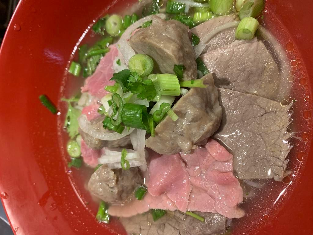 8B. COMBINATION PHO- PHỞ ĐẶC BIỆT · (steak, brisket & meatball)
bean sprouts, basil, jalapeno & lime