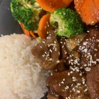 12B. RICE & TERIYAKI BEEF- COM TERIYAKI BO · Broccoli, carrot and beef